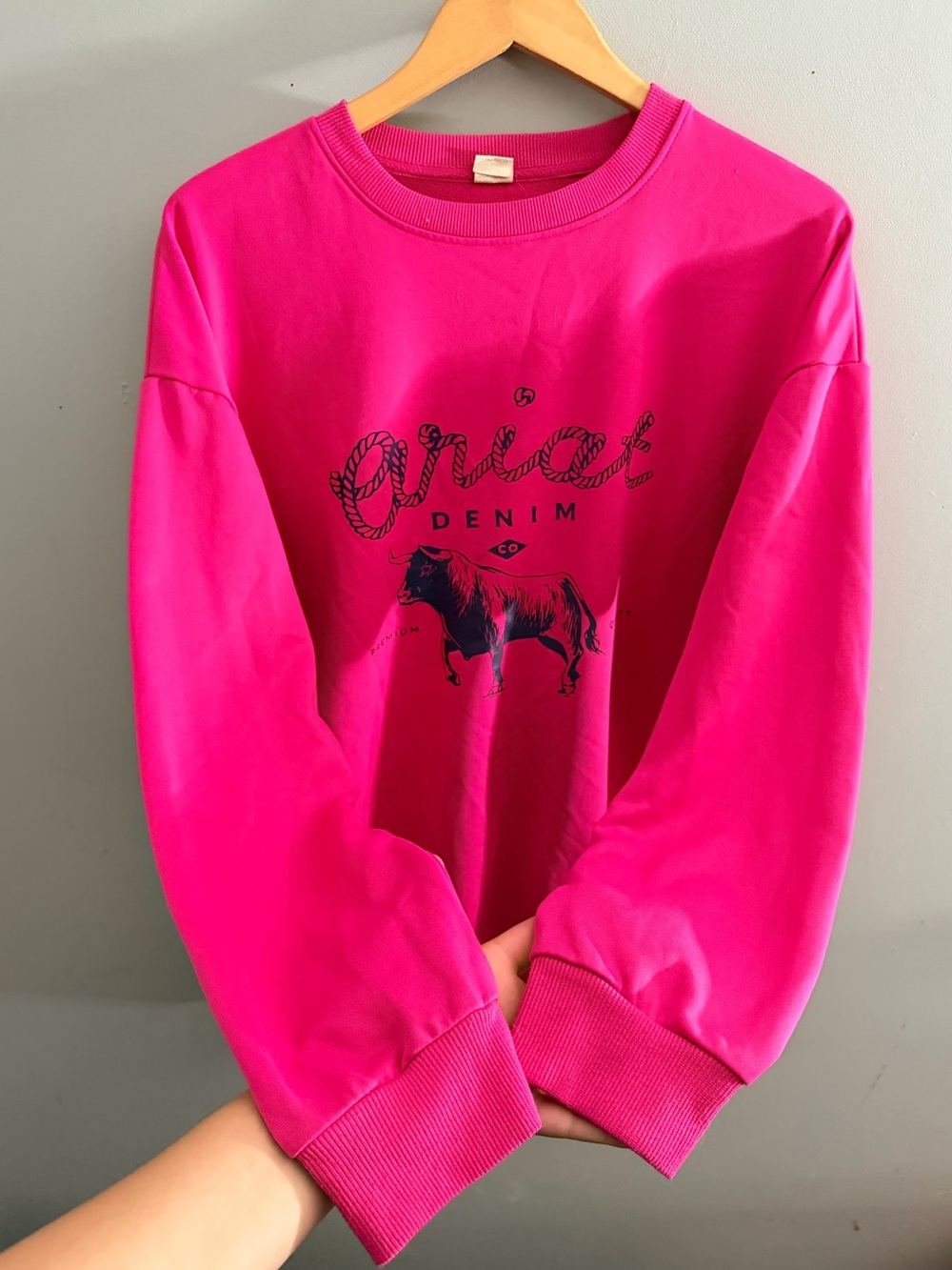 Ariat Denim Hot pink crew neck sweater bull cow print
